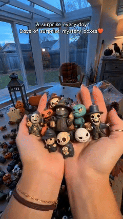 Animated collection of BooBoX™ Halloween mini figures being revealed